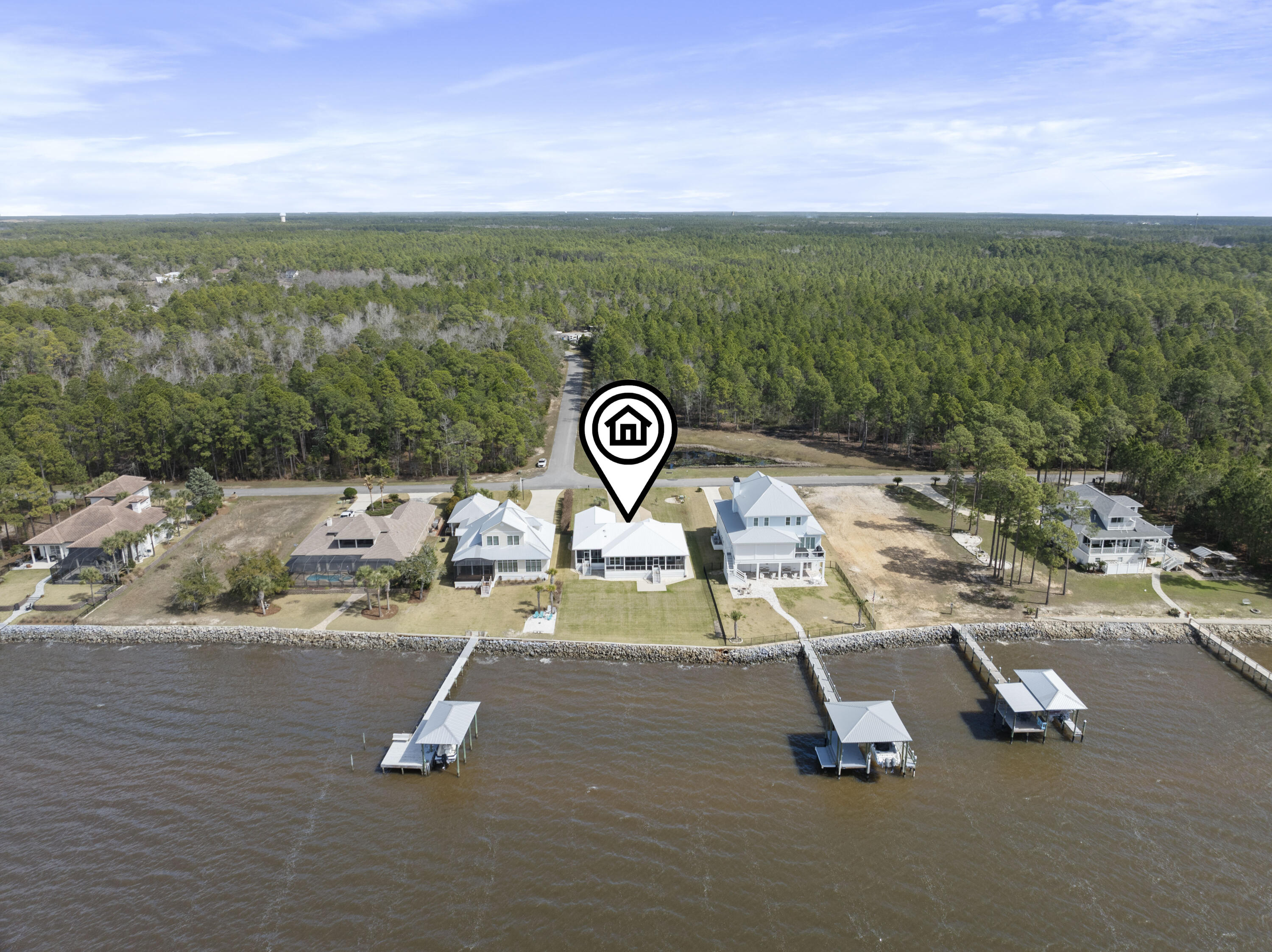10 South Sunset Harbour Freeport, FL 32439 - Photo 7 of 57 a view of a swimming pool with a yard