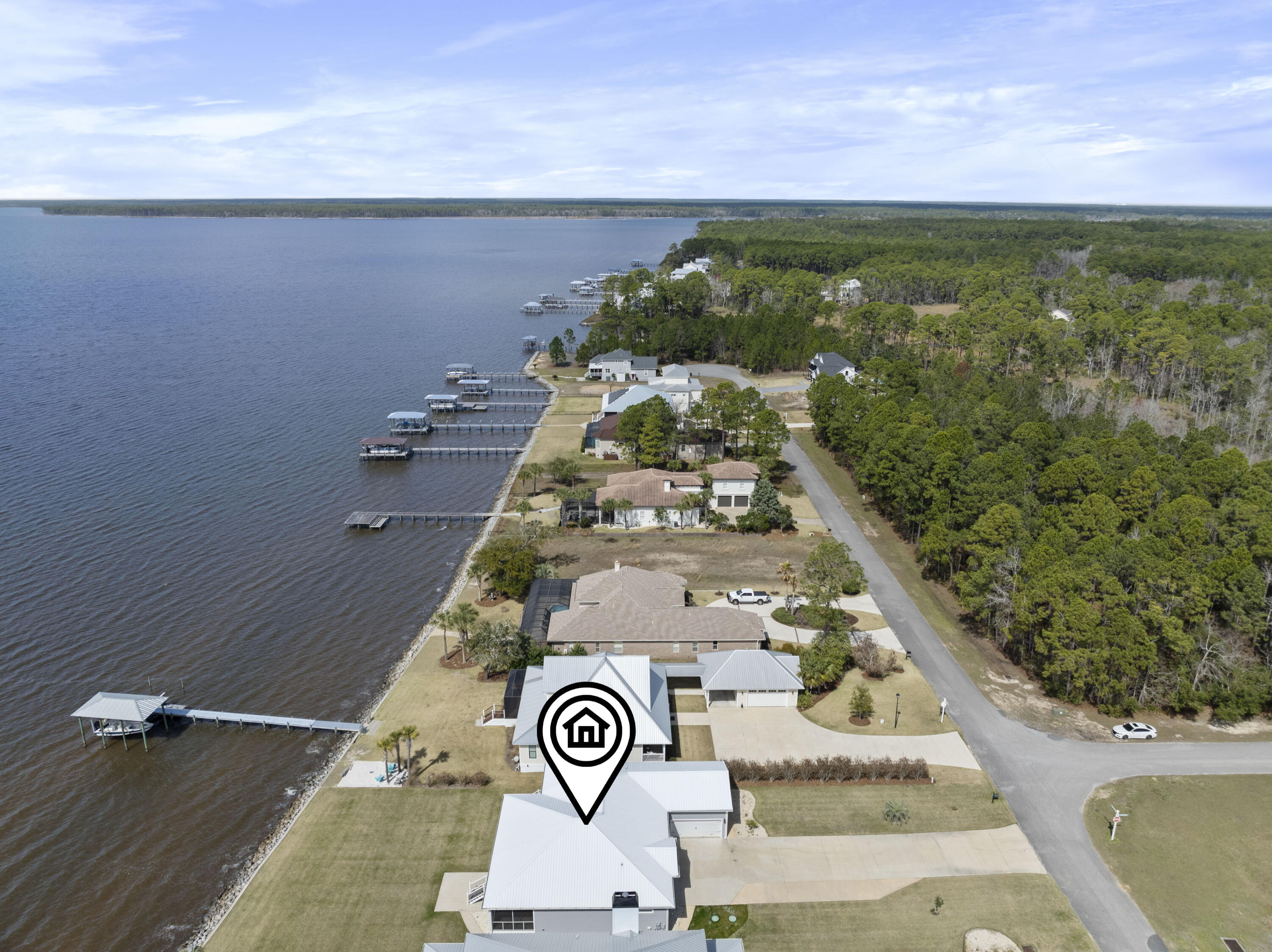 10 South Sunset Harbour Freeport, FL 32439 - Photo 9 of 57 an aerial view of a house with a yard