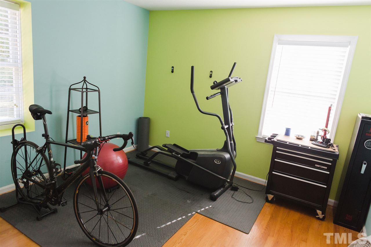 313 East Millbrook Road Raleigh, NC 27609 - Photo 22 of 25 Used as workout space, this is a good sized bedroom!