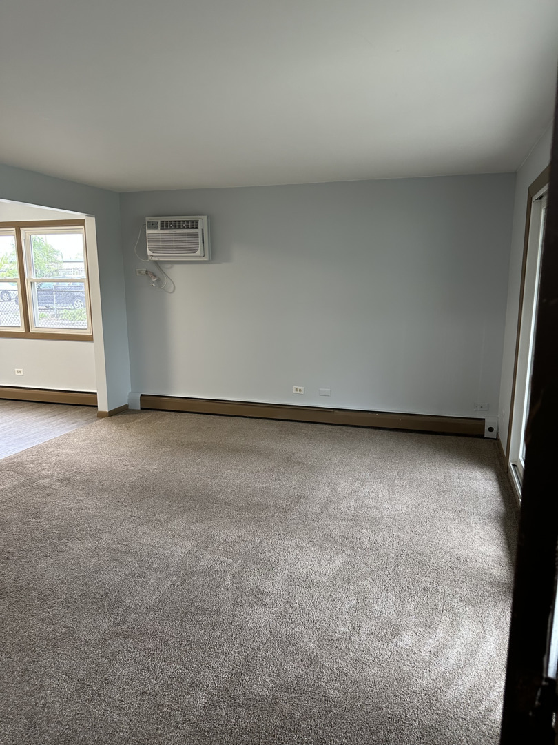 8020 West 84th Street Justice, IL 60458 - Photo 3 of 17 a view of an empty room with a window