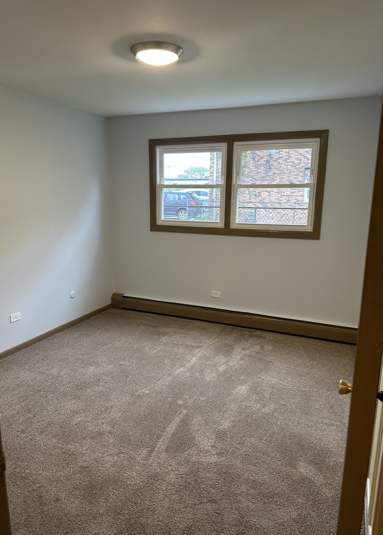 8020 West 84th Street Justice, IL 60458 - Photo 7 of 17 an empty room with a window