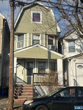 a front view of a house with balcony