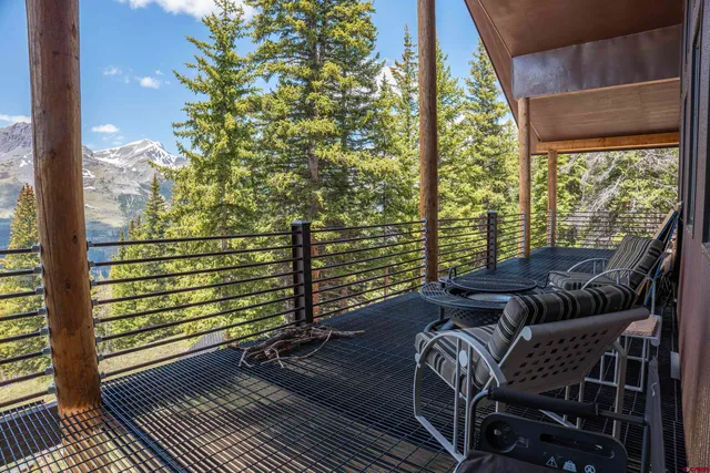 a view of balcony with furniture