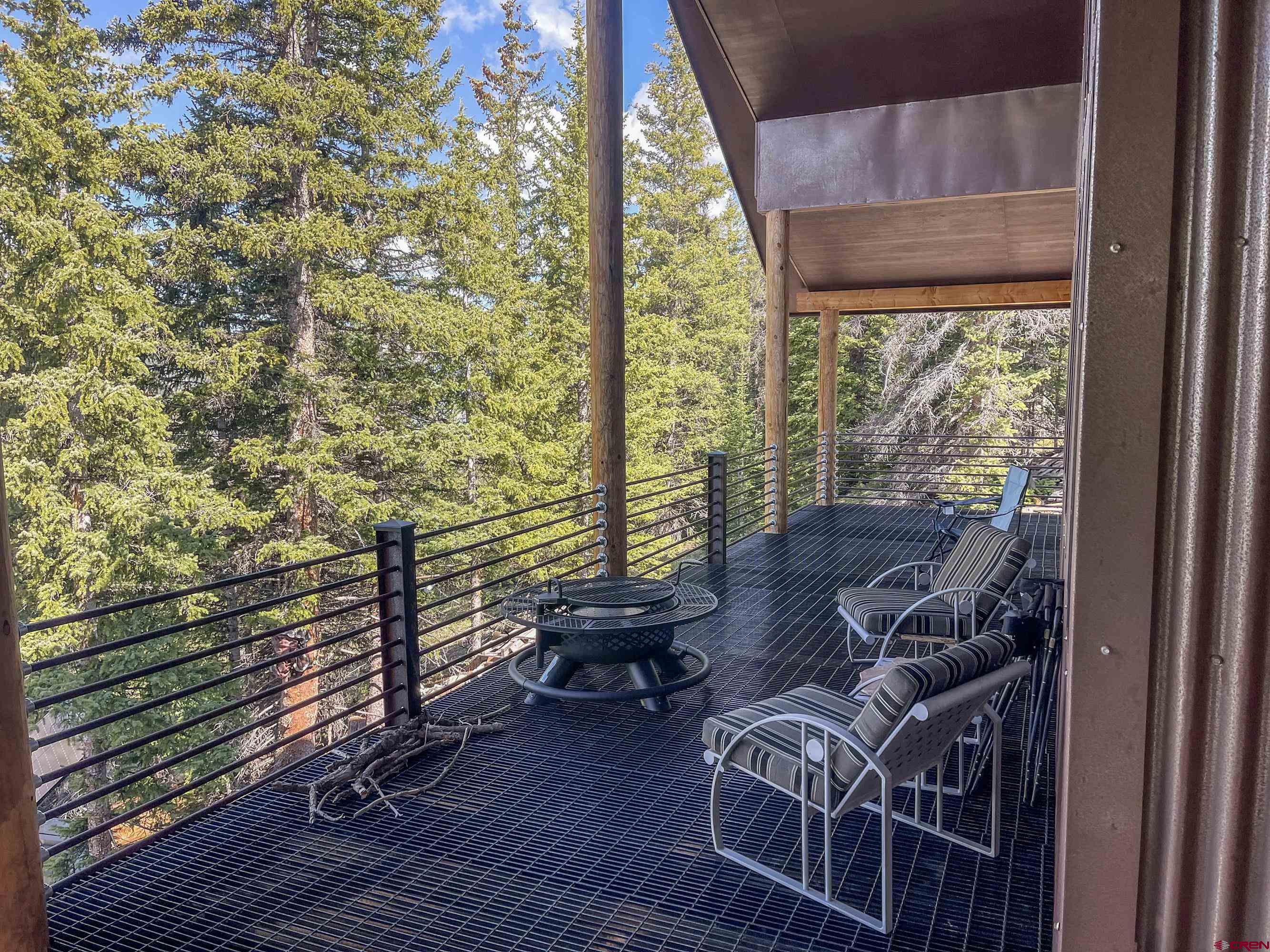 3300 County Road Silverton, CO 81433 - Photo 5 of 30 a view of balcony with furniture and wooden floor