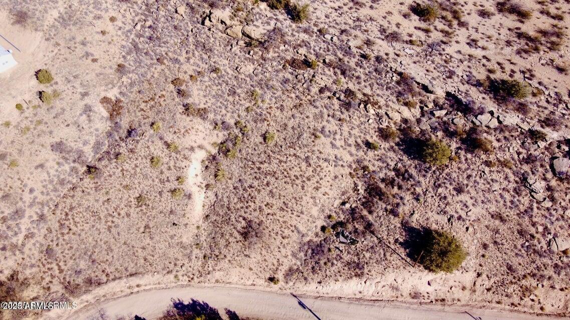 4860 East Goss Road, Unit 683 Rimrock, AZ 86335 - Photo 3 of 6 a view of a dry yard with wooden floor