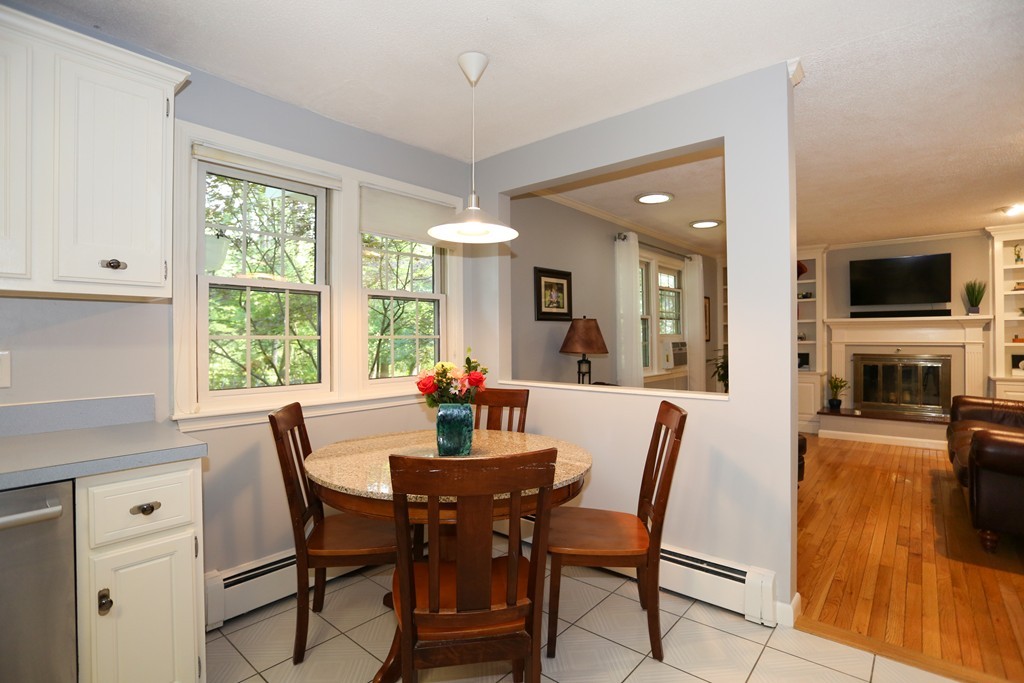 2 Woodside Road Framingham, MA 01701 - Photo 11 of 29 a view of a dining room with furniture window and wooden floor