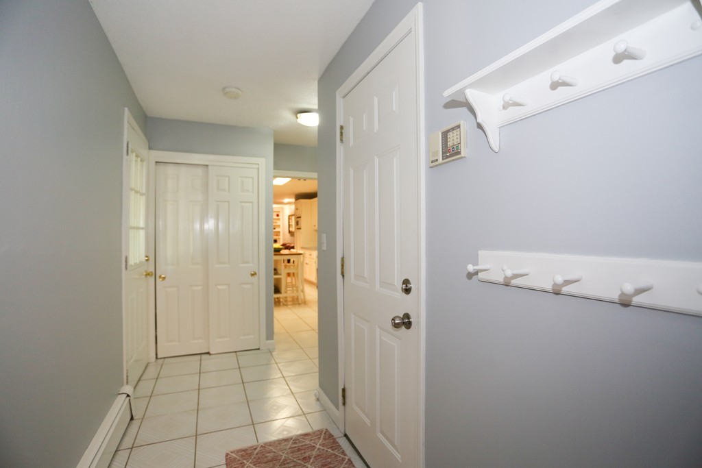 2 Woodside Road Framingham, MA 01701 - Photo 12 of 29 a bathroom with a shower and a glass door