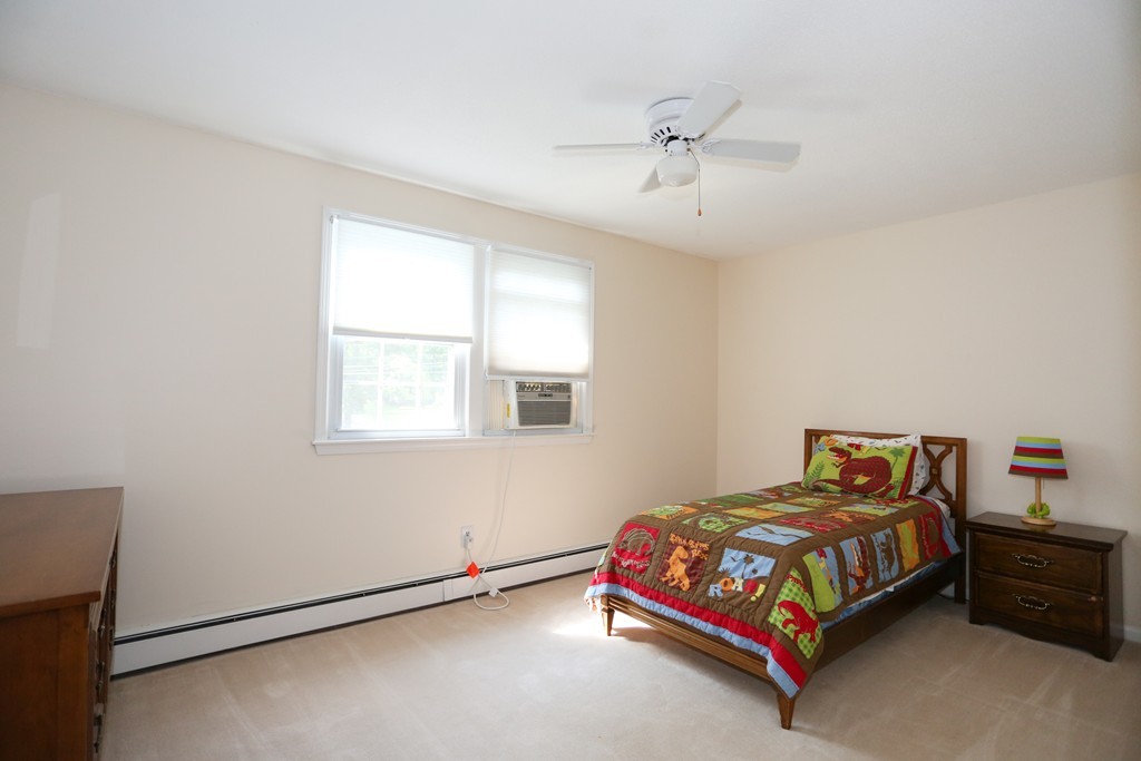 2 Woodside Road Framingham, MA 01701 - Photo 21 of 29 a bedroom with a bed and window