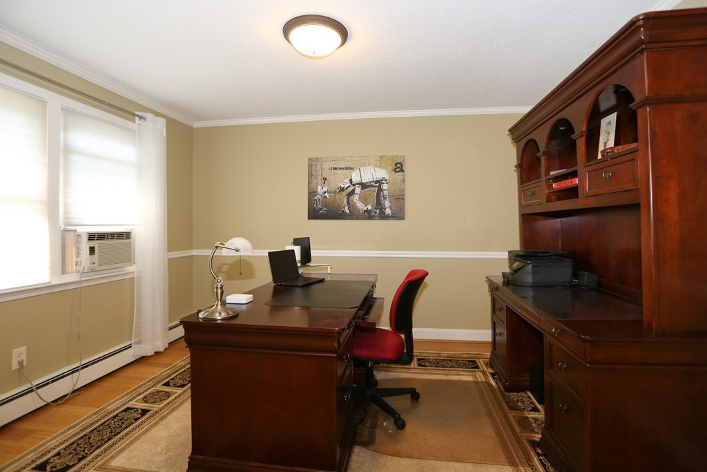 2 Woodside Road Framingham, MA 01701 - Photo 4 of 29 a view of a workspace with furniture and a window