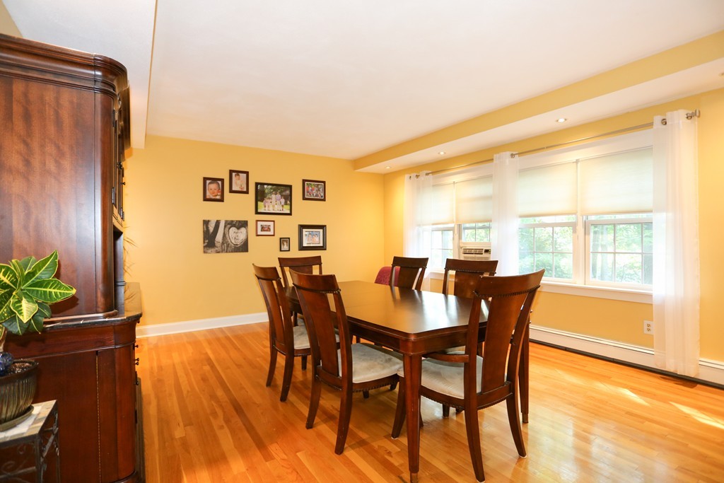 2 Woodside Road Framingham, MA 01701 - Photo 5 of 29 a view of a dining room with furniture and wooden floor