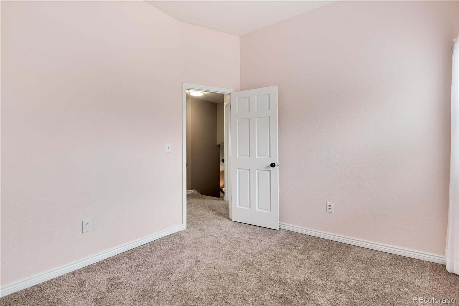 9866 Spring Hill Lane Highlands Ranch, CO 80129 - Photo 31 of 49 a view of an empty room
