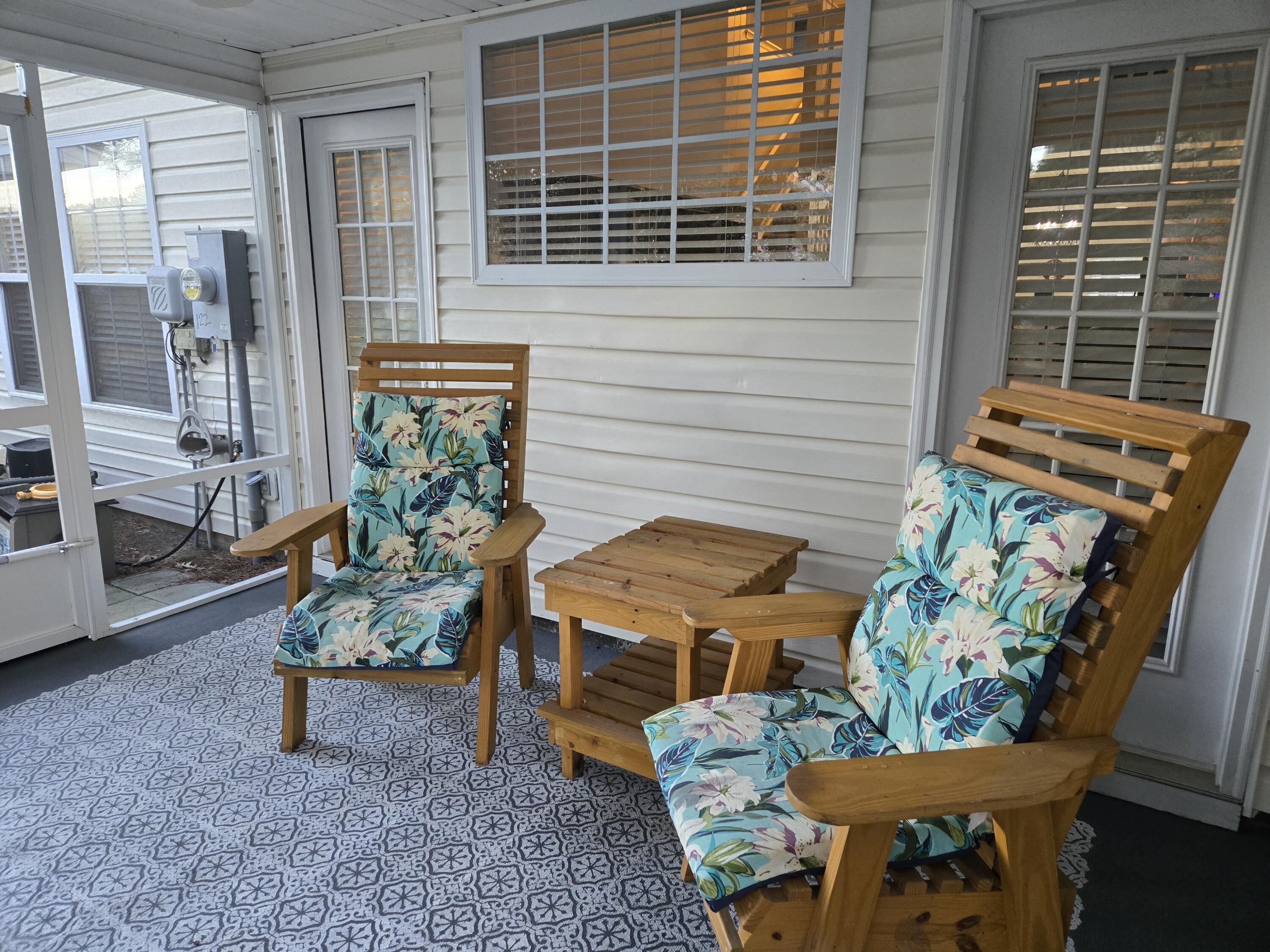 122 Greyson Circle Goose Creek, SC 29445 - Photo 40 of 41 Back screen porch has a ceiling fan