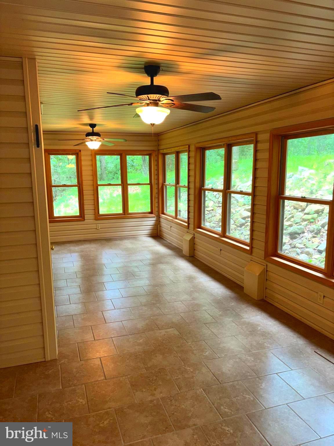 251 Riffey Mountain Lane Mathias, WV 26812 - Photo 24 of 33 Large 4 season sunroom 35 x 13