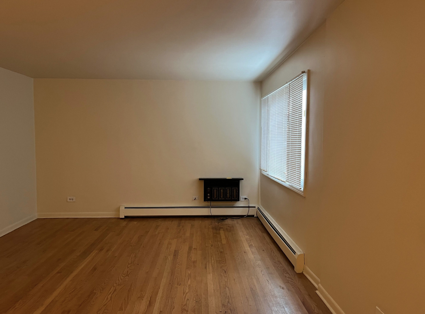 200 South Boulevard, Unit 2C Evanston, IL 60202 - Photo 5 of 16 a view of a room with wooden floor and a window