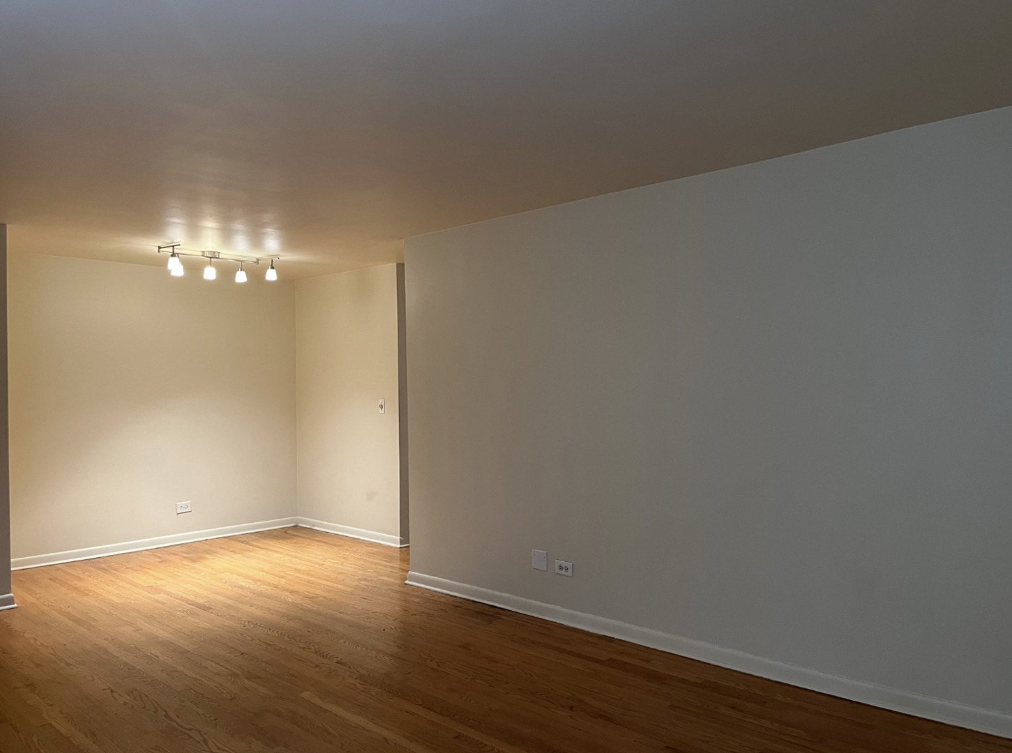 200 South Boulevard, Unit 2C Evanston, IL 60202 - Photo 6 of 16 a view of an empty room with wooden floor