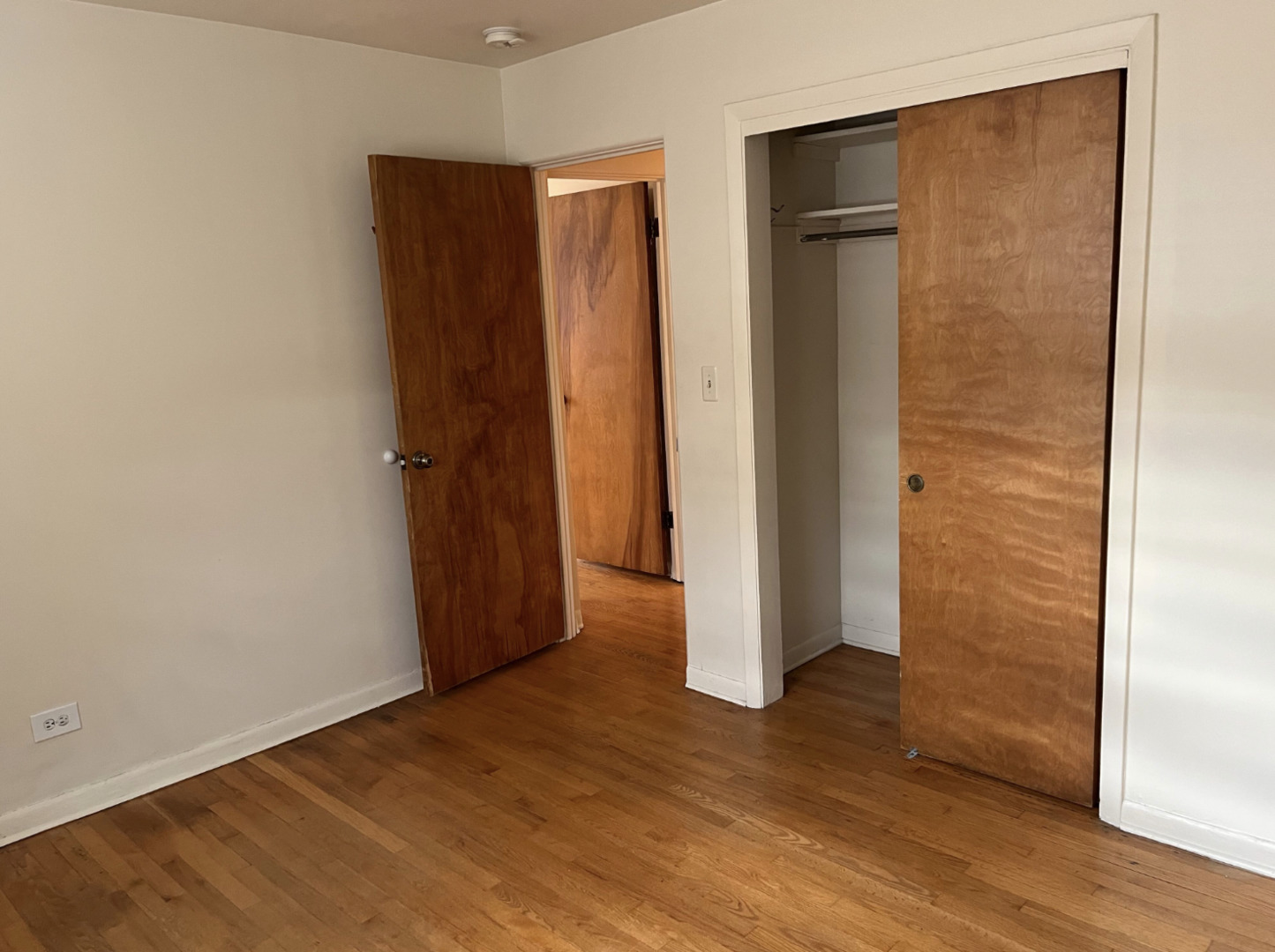 200 South Boulevard, Unit 2C Evanston, IL 60202 - Photo 10 of 16 an empty room with wooden floor and closet area