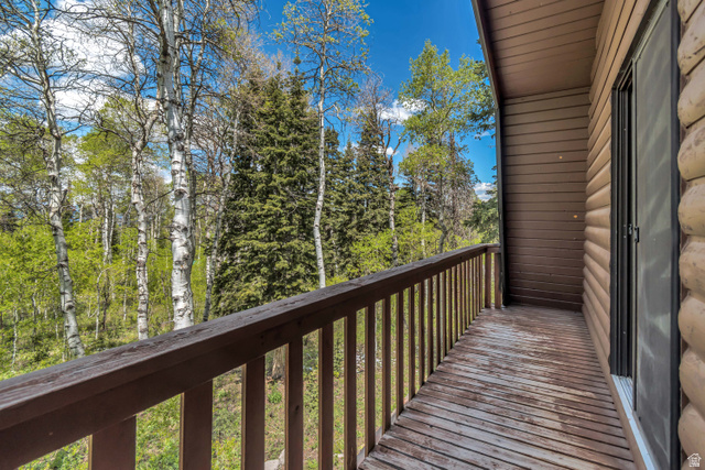 11237 East Aspen Road, Unit 74 Heber City, UT 84032 - Photo 18 of 32 Outdoor balcony with wood railing and decking