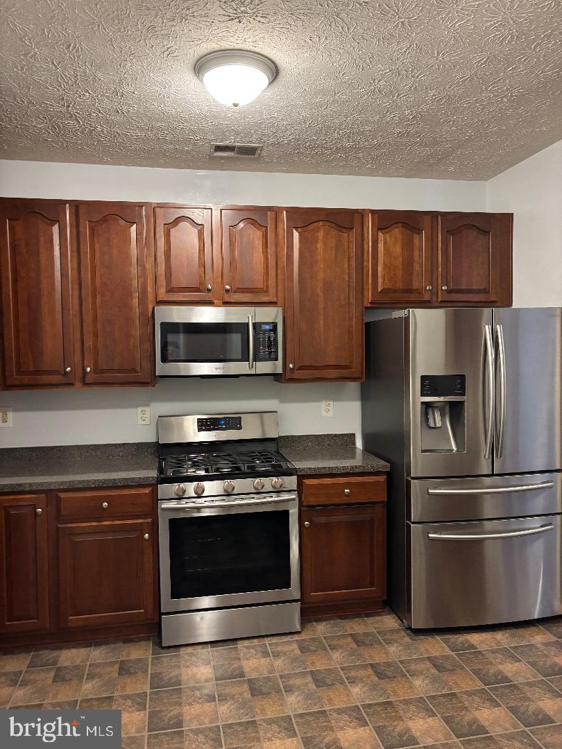 4926 Brightleaf Court, Unit 4926 Rosedale, MD 21237 - Photo 7 of 22 stainless steal appliances