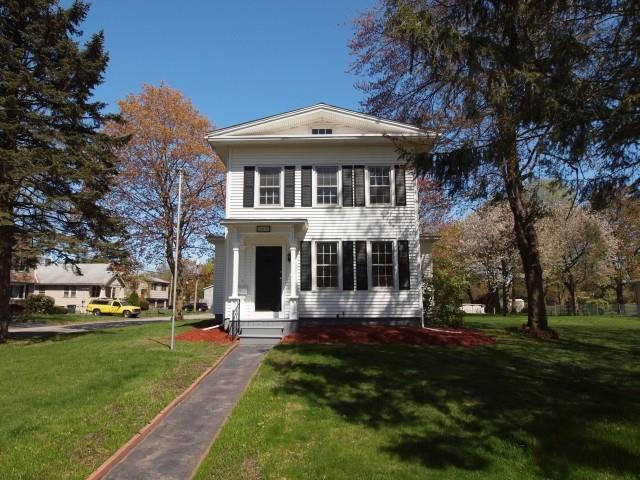 263 North Street Milford, CT 06461 - Photo 1 of 1 a front view of a house with a yard table and chairs