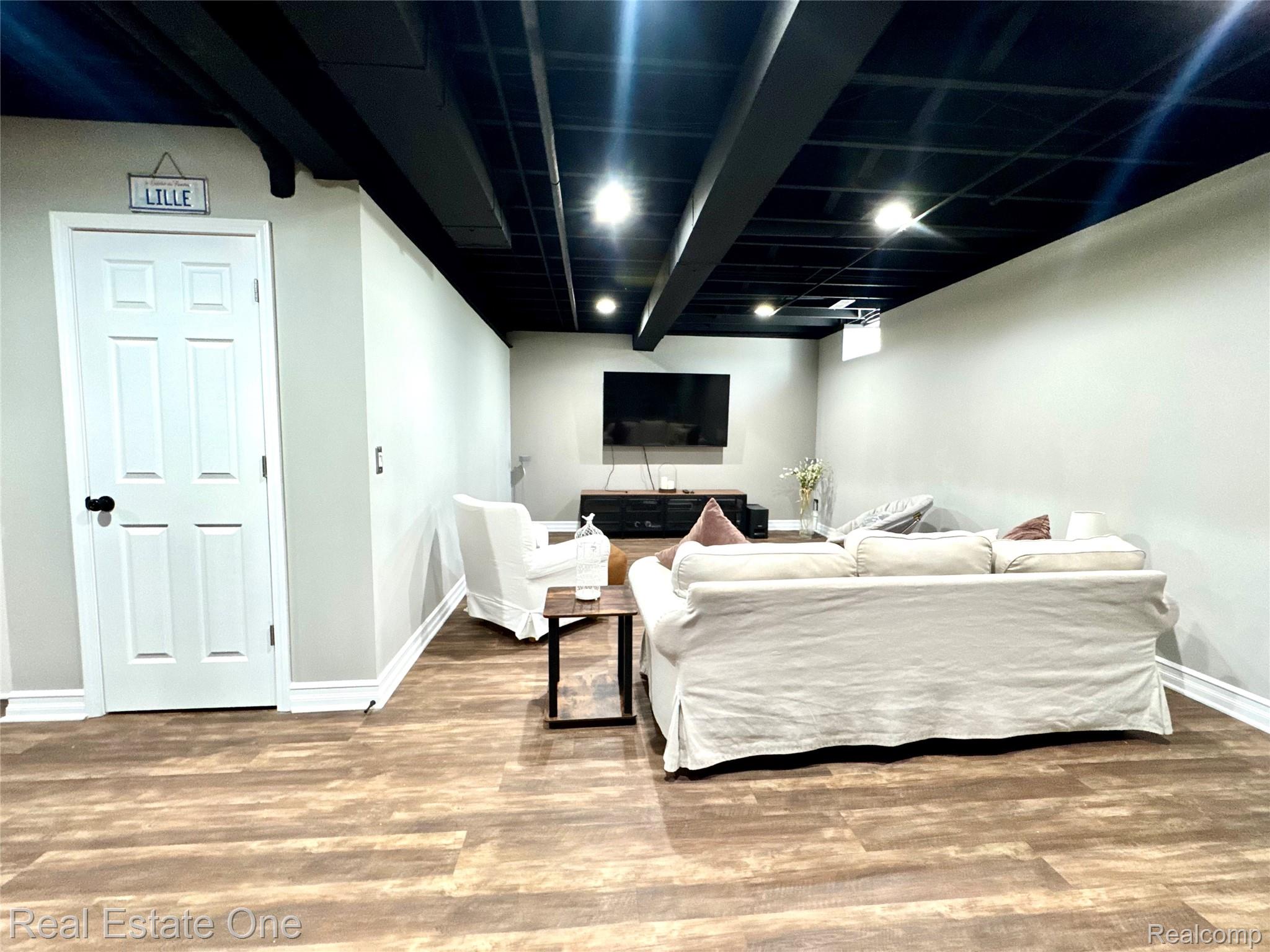 419 Roundview Drive Rochester, MI 48307 - Photo 17 of 29 Bedroom with baseboards and wood finished floors
