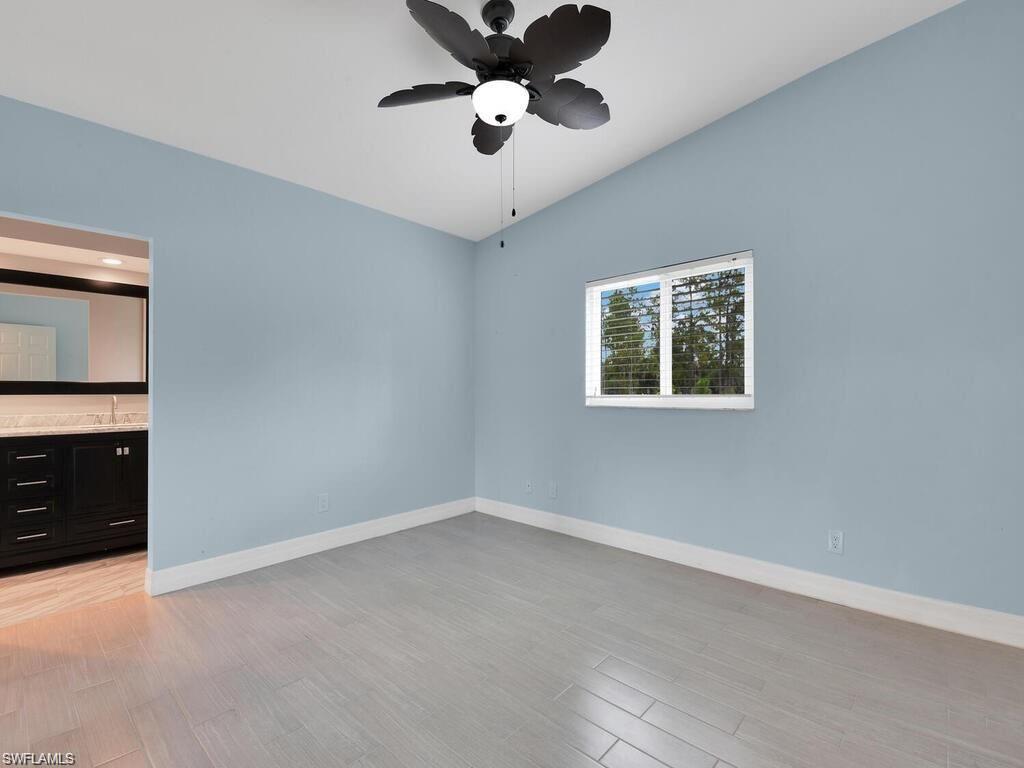 260 12th Street Southeast Naples, FL 34117 - Photo 18 of 29 a view of an empty room with a window