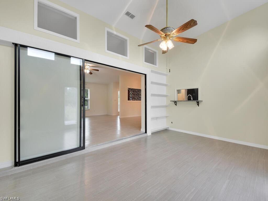260 12th Street Southeast Naples, FL 34117 - Photo 22 of 29 a view of an empty room with a window