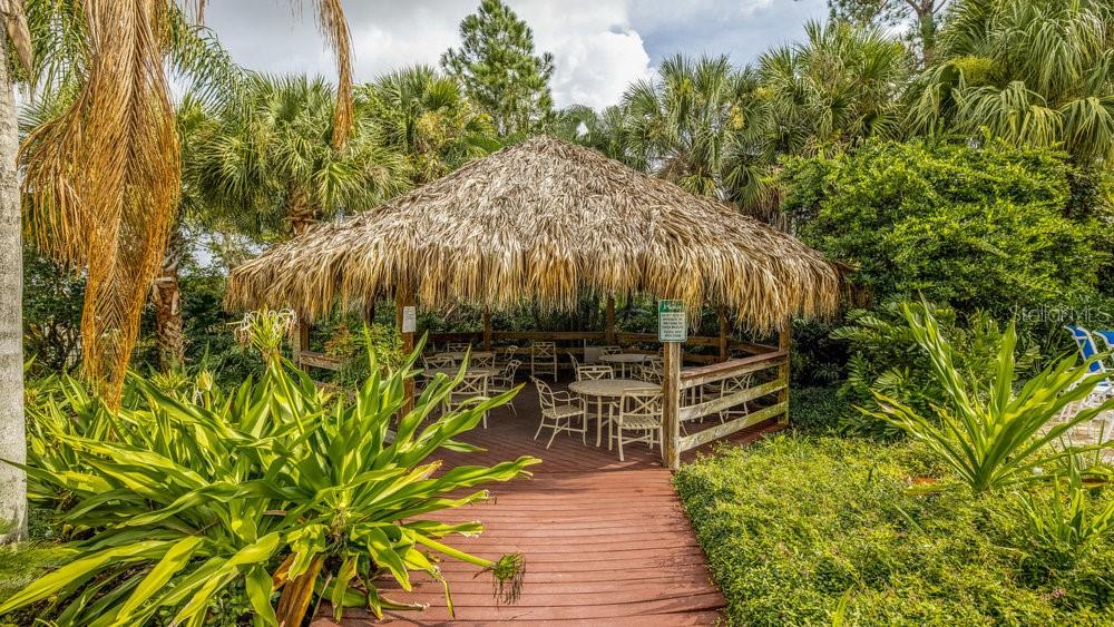 205 Watling Way, Unit 24205 Davenport, FL 33897 - Photo 40 of 58 a view of a backyard with chairs