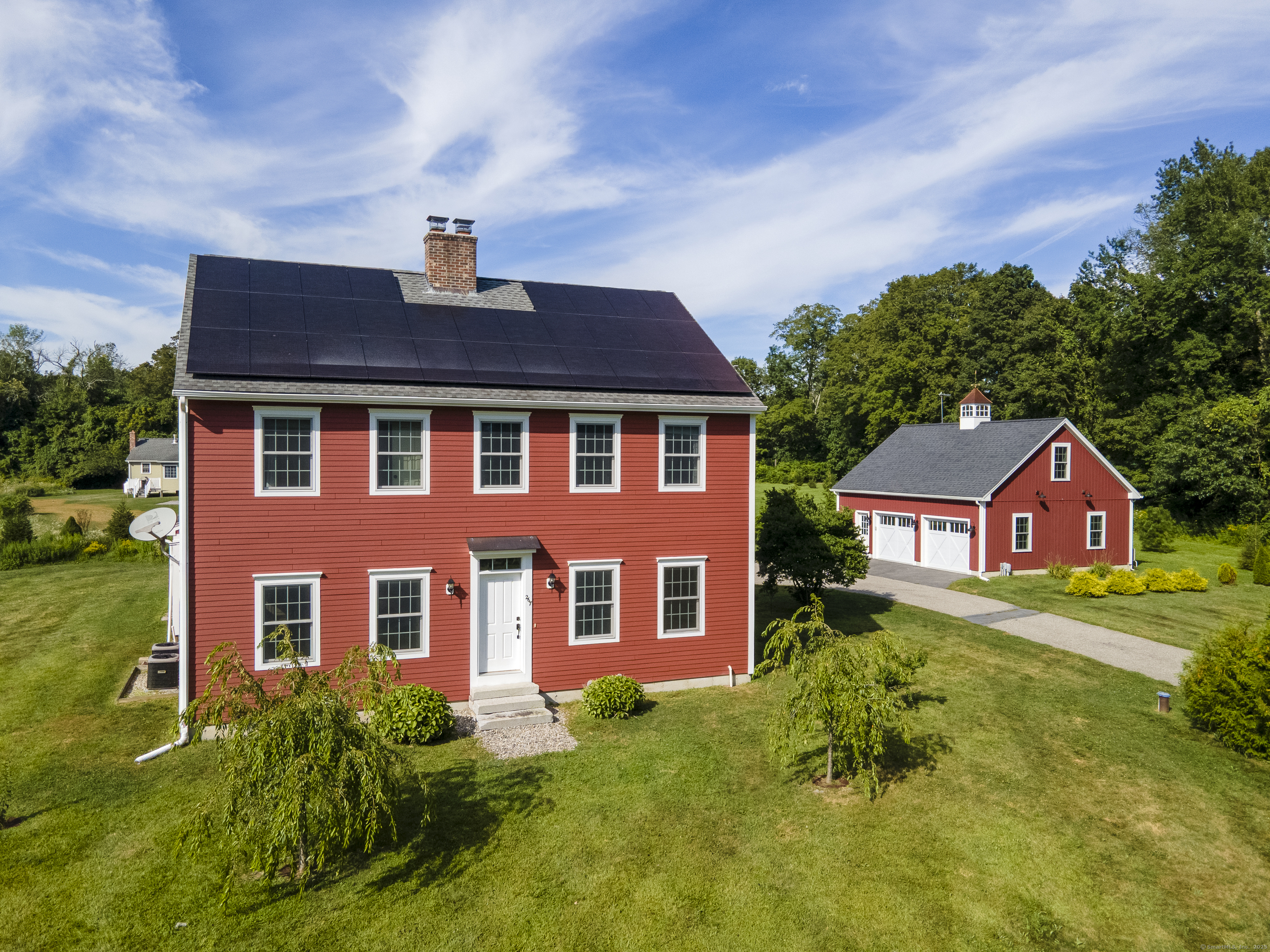 267 Chase Road Thompson, CT 06277 - Photo 1 of 32 front view of a house with a yard