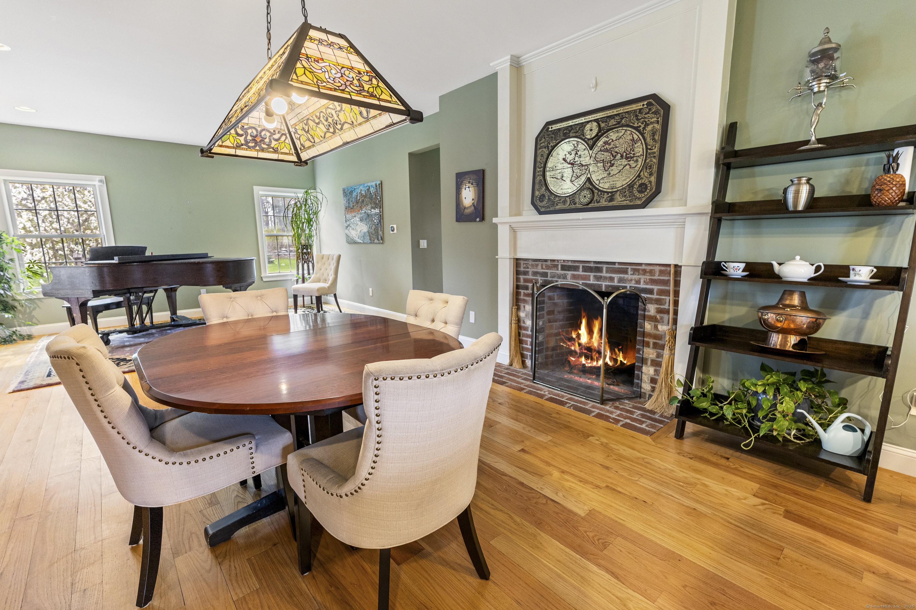 267 Chase Road Thompson, CT 06277 - Photo 12 of 32 a living room with furniture and a fireplace