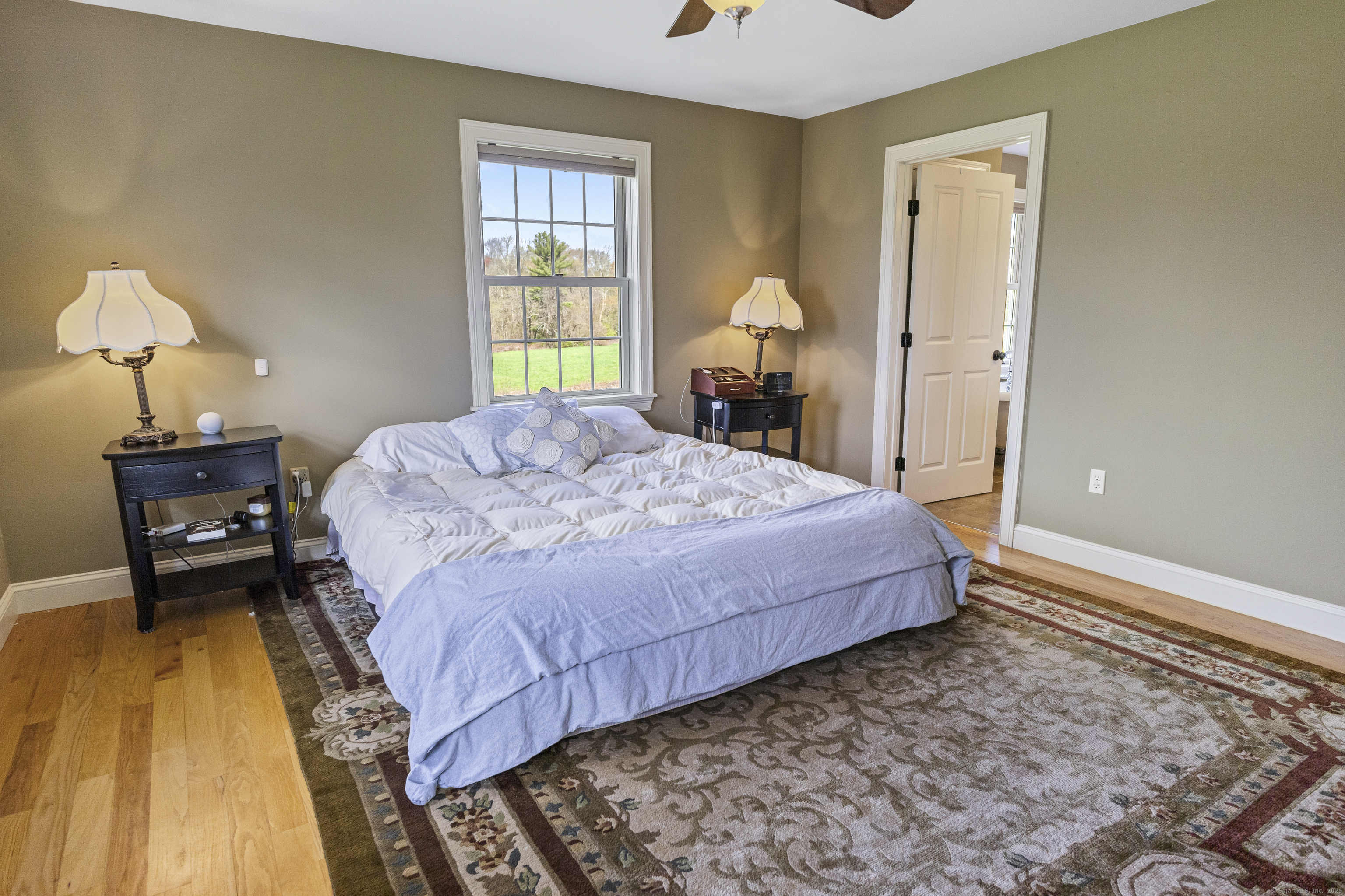267 Chase Road Thompson, CT 06277 - Photo 22 of 32 a bedroom with a bed and a dresser