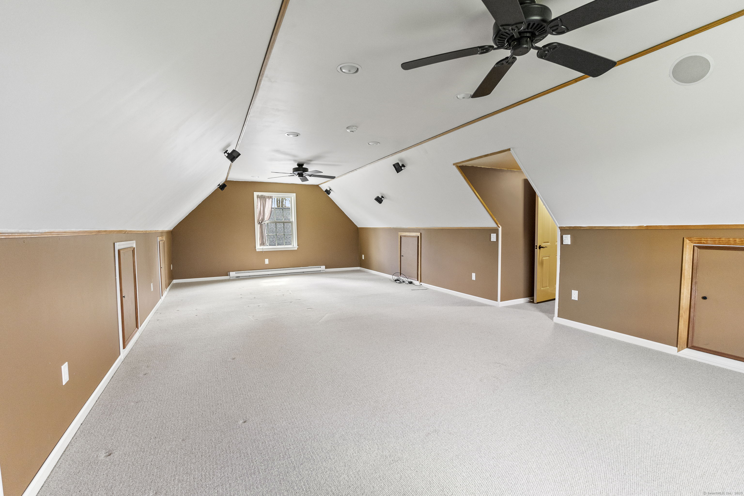 267 Chase Road Thompson, CT 06277 - Photo 26 of 32 a view of a livingroom with a ceiling fan and window