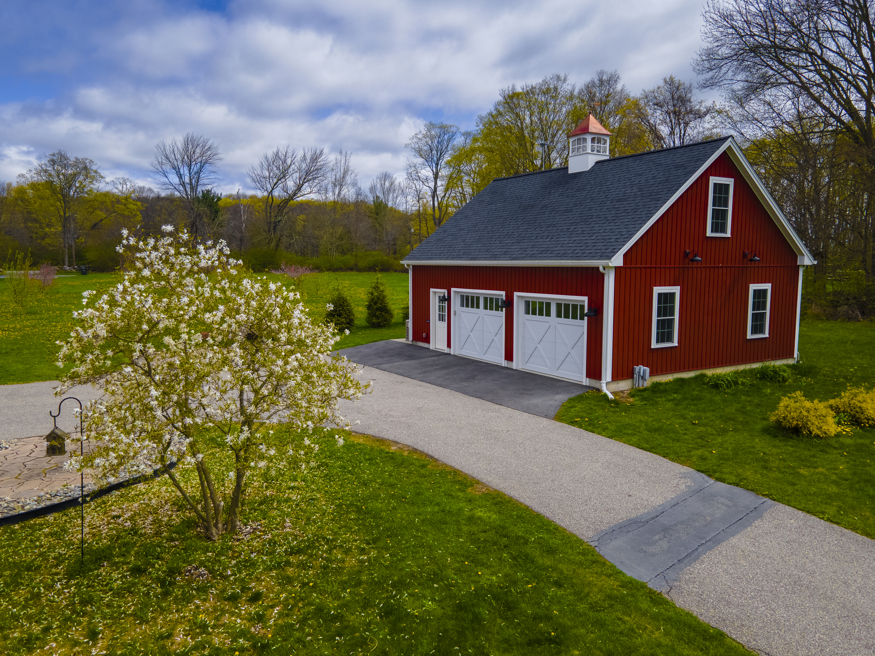 267 Chase Road Thompson, CT 06277 - Photo 27 of 32 a front view of a house with a yard