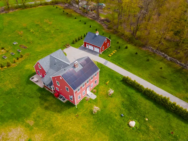 a view of a golf course with chairs