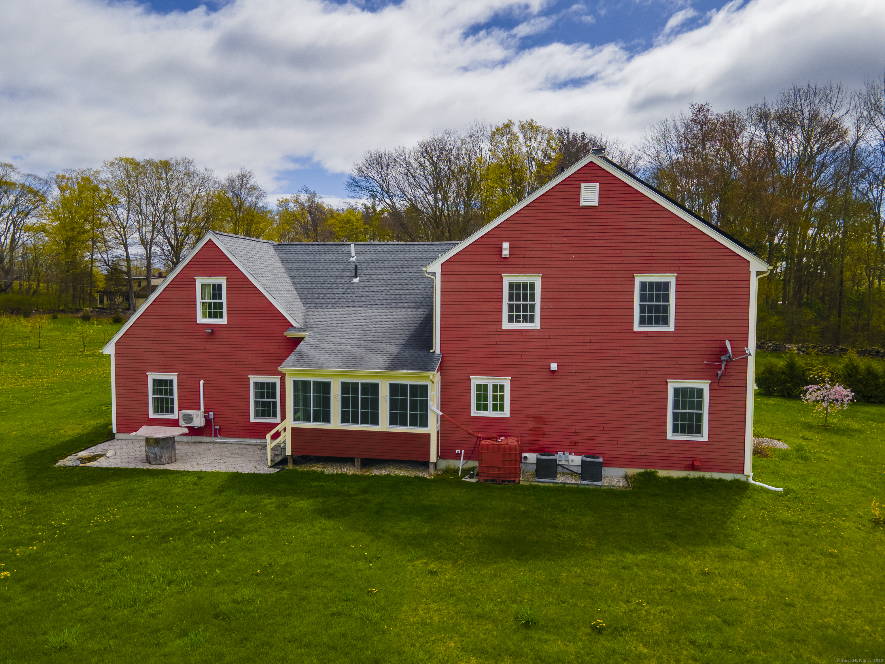 267 Chase Road Thompson, CT 06277 - Photo 5 of 32 a front view of a house with garden