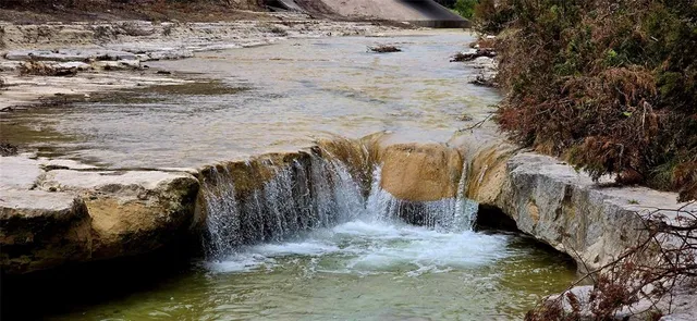 a aerial view of a house with a yard