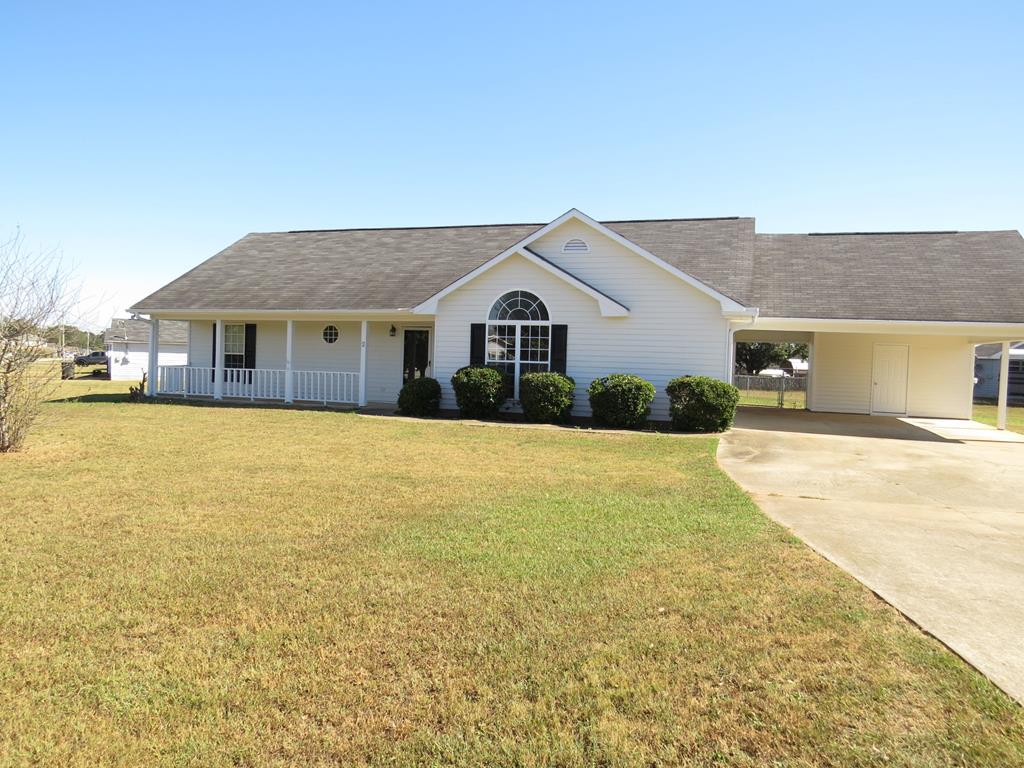 2 Whippoorwill Lane Fort Mitchell, AL 36856 - Photo 1 of 27 a front view of a house with a yard