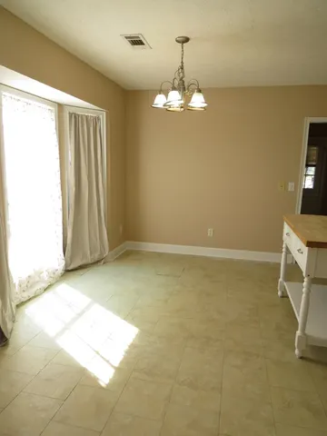 a view of livingroom with chandelier