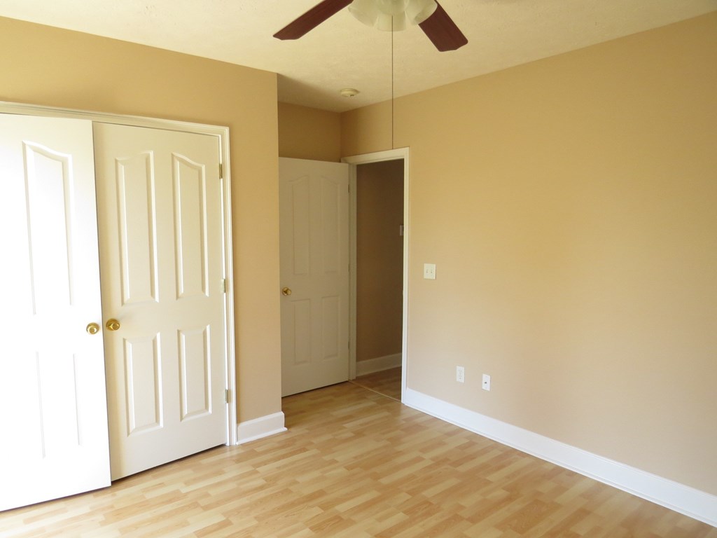 2 Whippoorwill Lane Fort Mitchell, AL 36856 - Photo 20 of 27 a view of an empty room with wooden floor