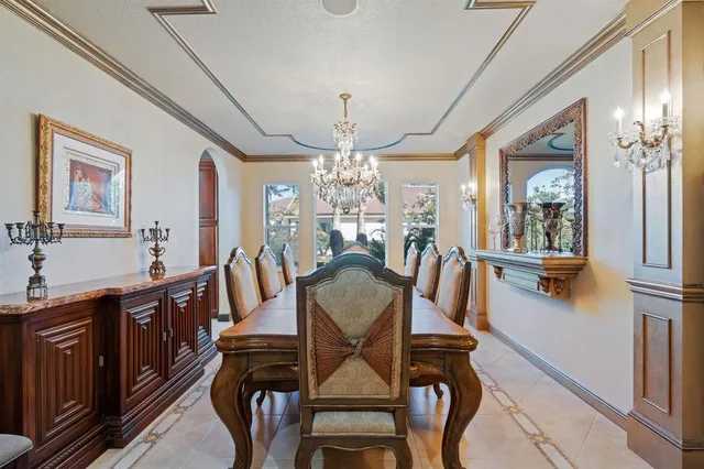 a large bathroom with a large tub and sink