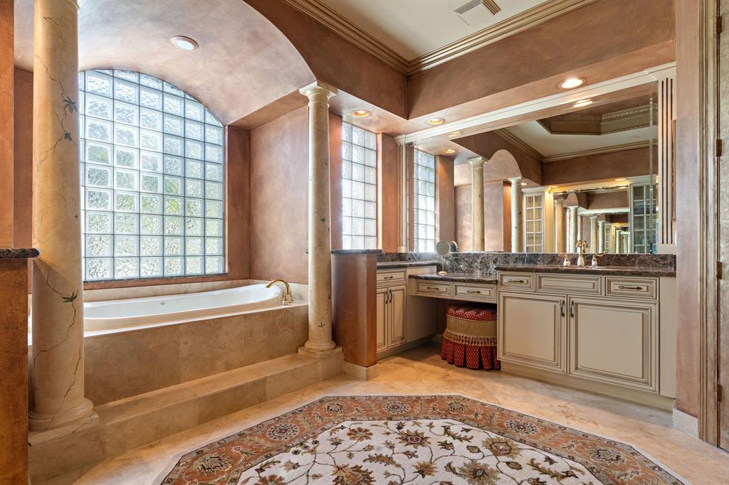 3413 Dovecote Meadow Lane Davie, FL 33328 - Photo 32 of 68 a large bathroom with a large tub and sink