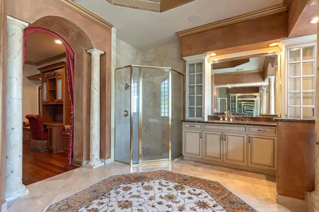 a white toilet sitting next to a bath tub