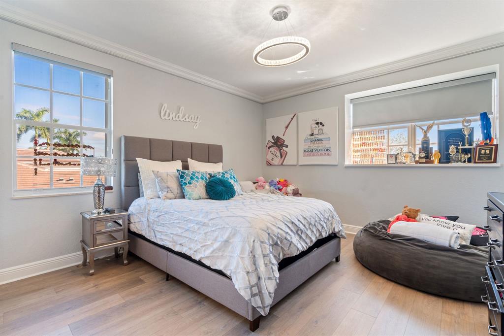 3413 Dovecote Meadow Lane Davie, FL 33328 - Photo 46 of 68 a bedroom with a bed and a window