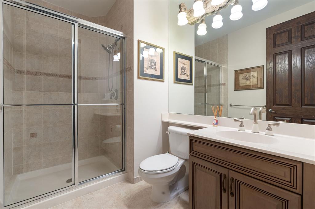 3413 Dovecote Meadow Lane Davie, FL 33328 - Photo 50 of 68 a bathroom with a sink a toilet and shower