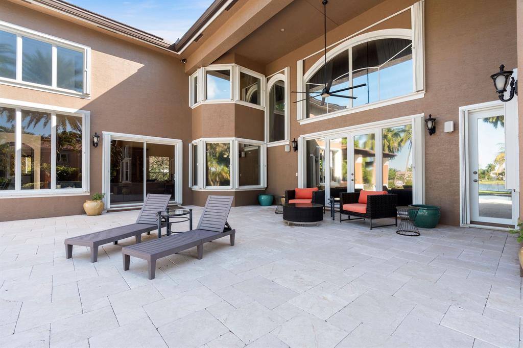 3413 Dovecote Meadow Lane Davie, FL 33328 - Photo 56 of 68 a living room with furniture and a ceiling fan