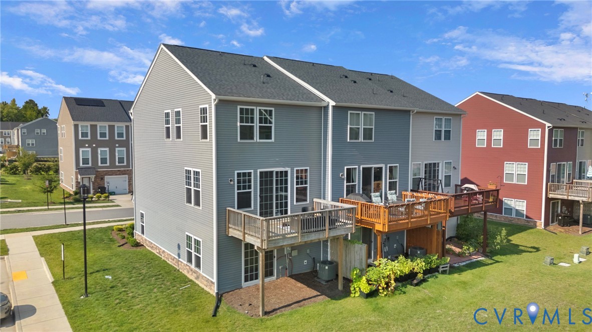 640 Rivanna Hill Road Glen Allen, VA 23060 - Photo 4 of 37 Modern three-story residence featuring a light blu