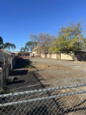 a view of a yard with an outdoor space
