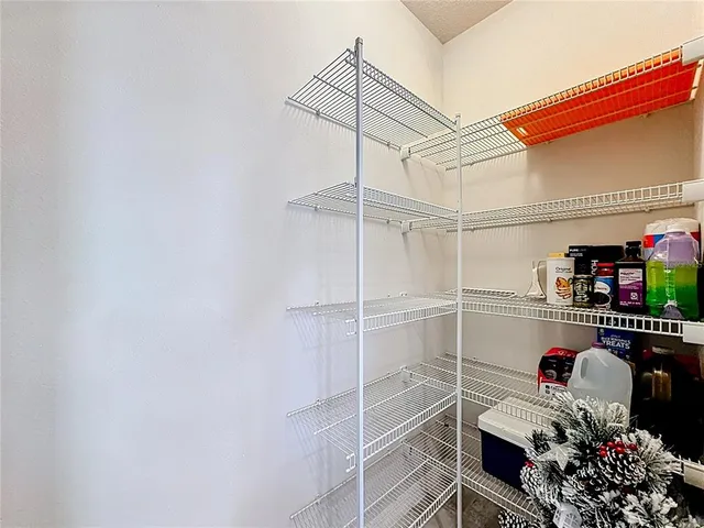 a room with lots of different colored cloths