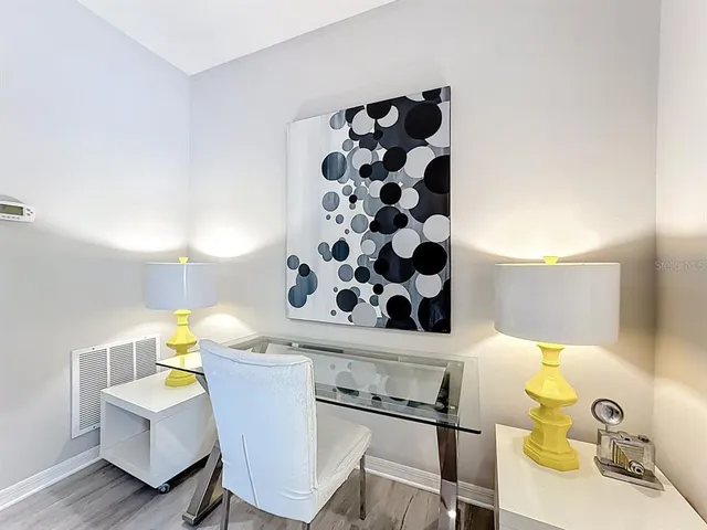 a room with a table and chairs