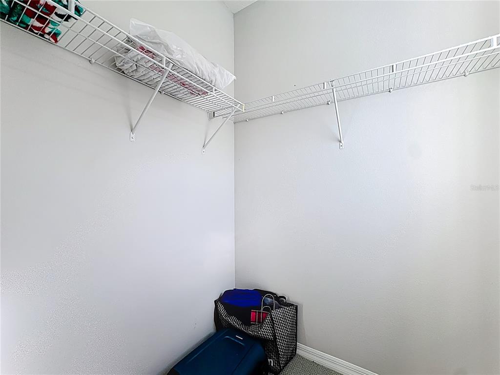 11209 Grander Drive Windermere, FL 34786 - Photo 28 of 35 a small bathroom with a shower