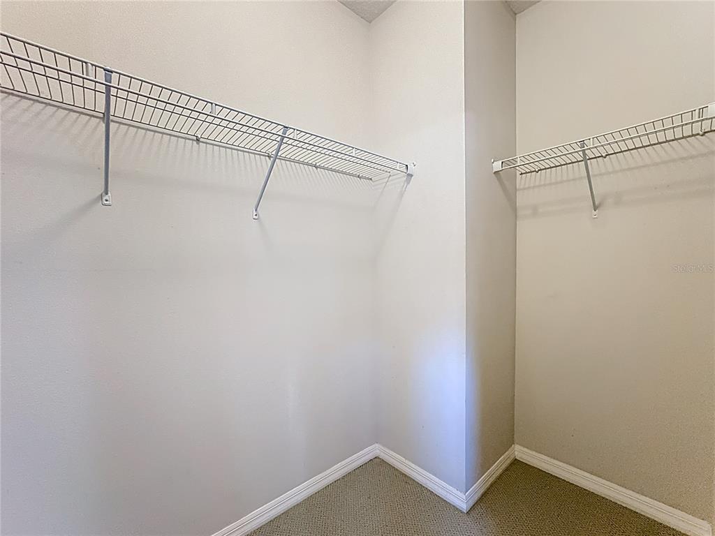 11209 Grander Drive Windermere, FL 34786 - Photo 30 of 35 a view of a room with racks on the wall